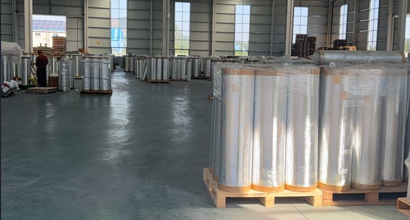 Packed PET rolls staged before they leave the factory.